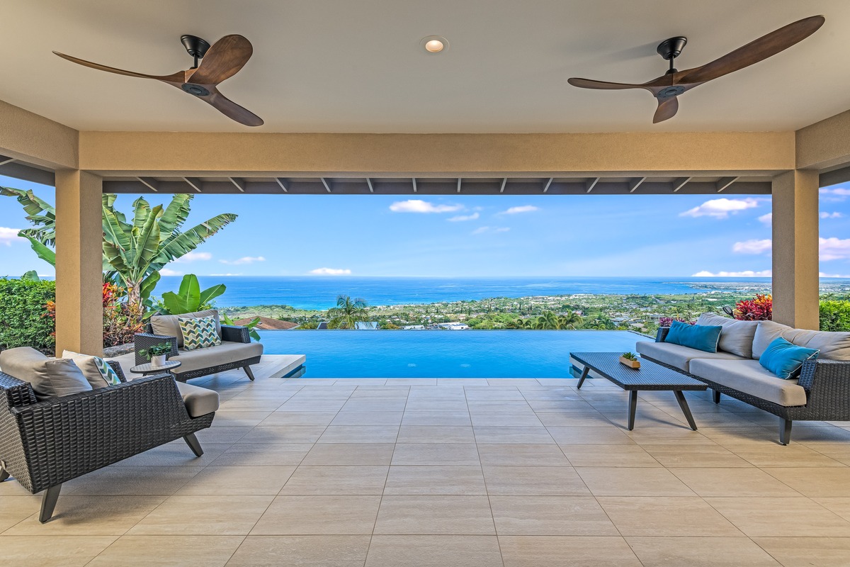 Ocean views and saltwater pool from the covered lanai at 76-6406 Kilohana Street